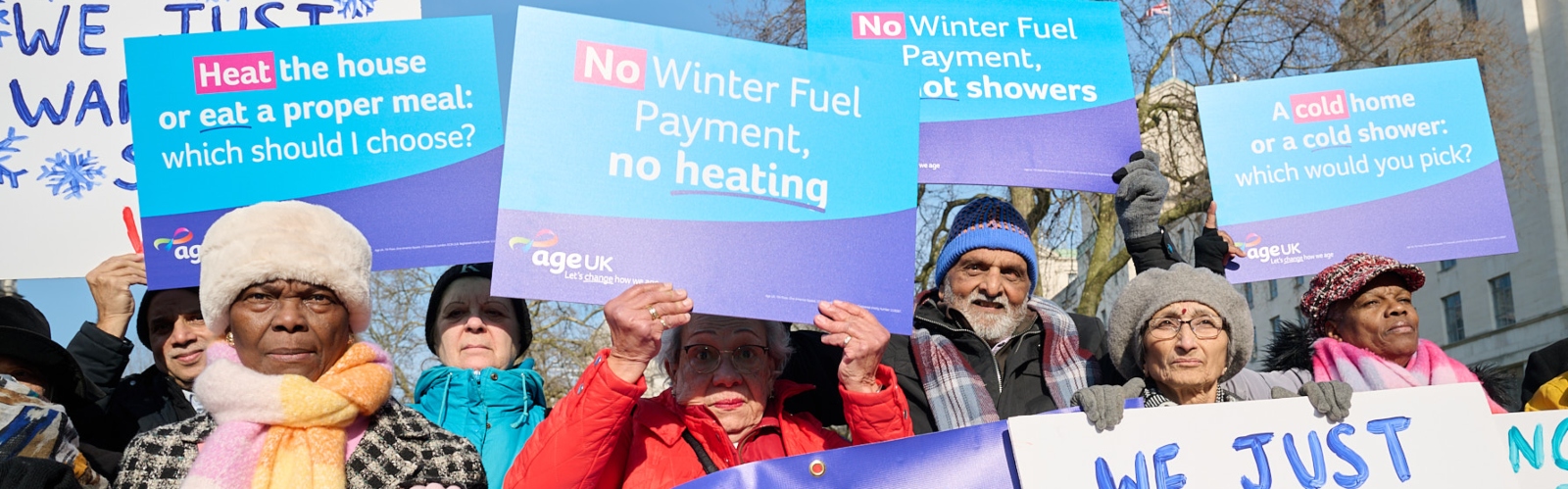 A group of older people with placards, protesting the Winter Fuel Payment changes